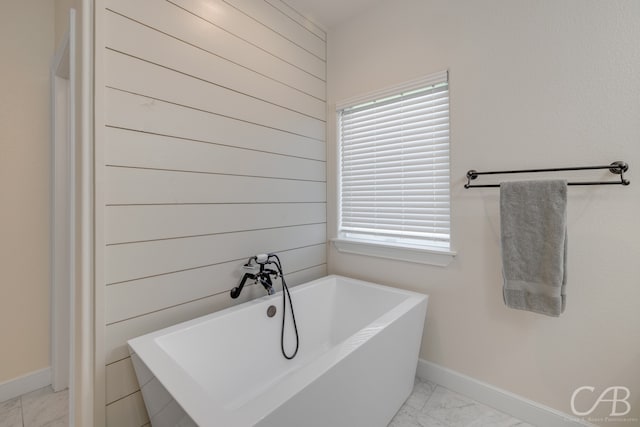 bathroom featuring a tub