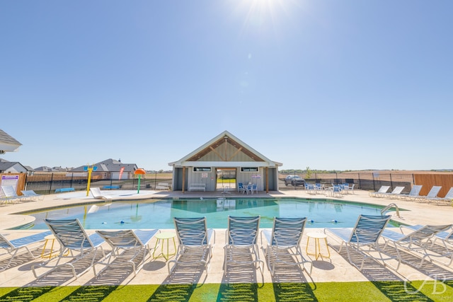 view of swimming pool featuring a patio area