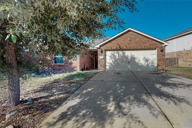 single story home with a garage