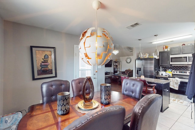 view of tiled dining space