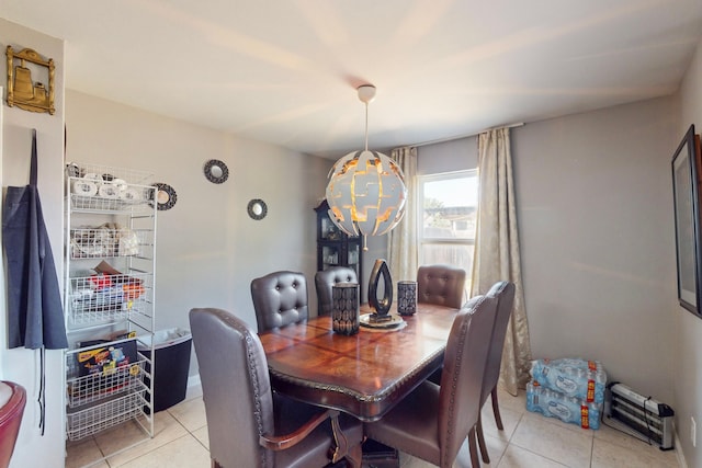 dining space with light tile patterned flooring