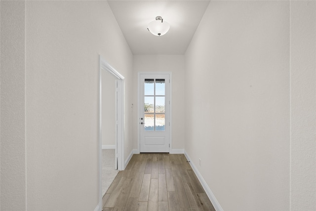 entryway with light hardwood / wood-style floors