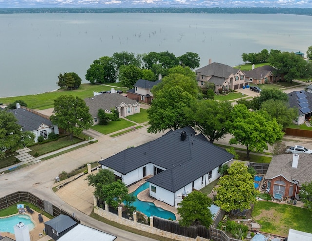 drone / aerial view with a water view