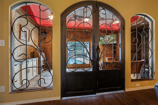 entrance foyer featuring french doors and wood-type flooring