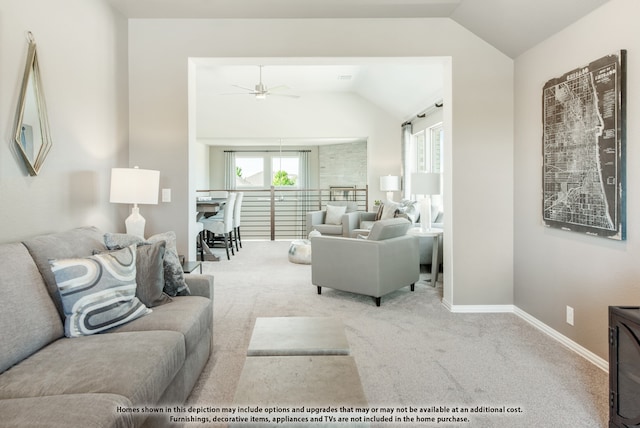 living room with lofted ceiling, light colored carpet, and ceiling fan