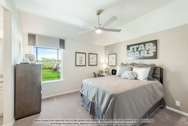 bedroom featuring light colored carpet and ceiling fan