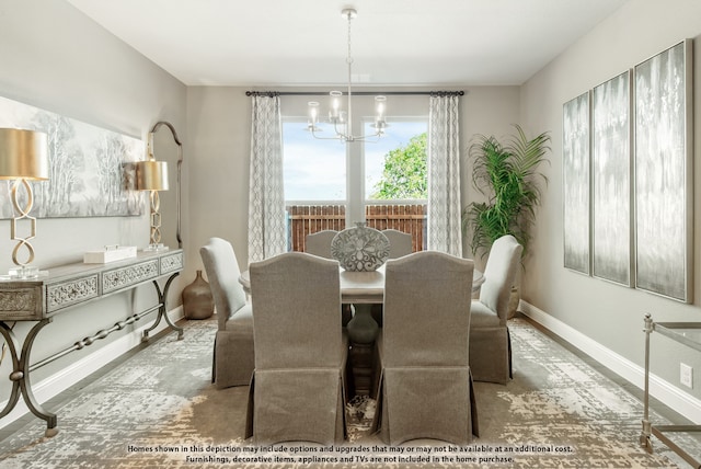 dining space with a notable chandelier