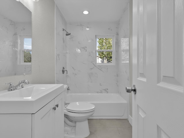 full bathroom with vanity, toilet, tile patterned floors, and tiled shower / bath