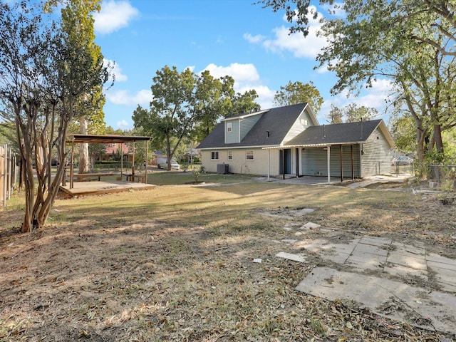 view of yard with a patio area and central AC unit