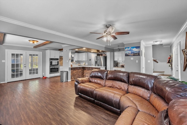 living room featuring ornamental molding, french doors, ceiling fan, and dark wood-type flooring