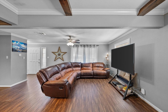 living room featuring beamed ceiling, dark hardwood / wood-style floors, and ornamental molding