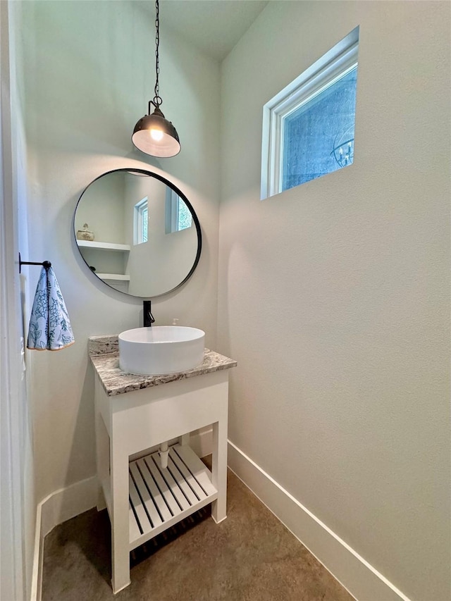 166 Oak Ridge Loop, Whitney, TX 76692 - bathroom featuring baseboards and vanity