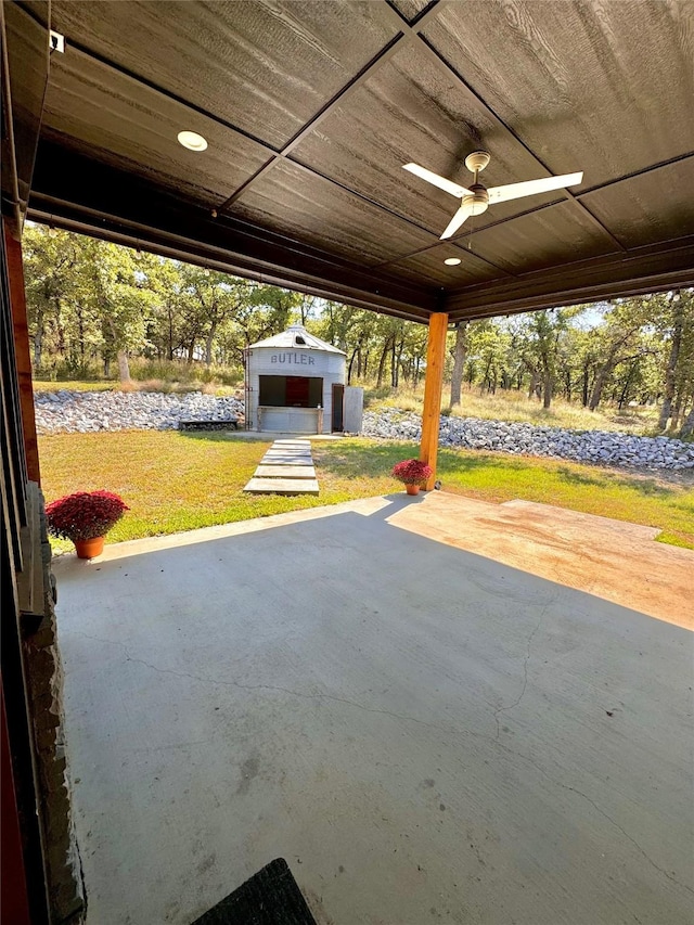 166 Oak Ridge Loop, Whitney, TX 76692 - view of patio / terrace with ceiling fan and an outbuilding