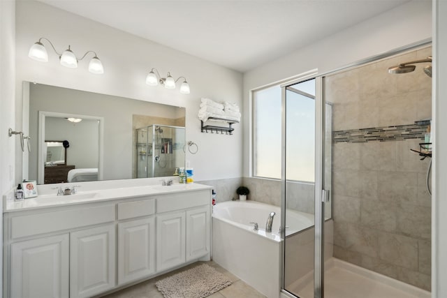 bathroom featuring vanity, plus walk in shower, and tile patterned flooring