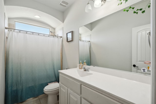 bathroom featuring vanity, toilet, curtained shower, and tile patterned flooring