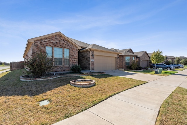 ranch-style house featuring a front yard and a garage