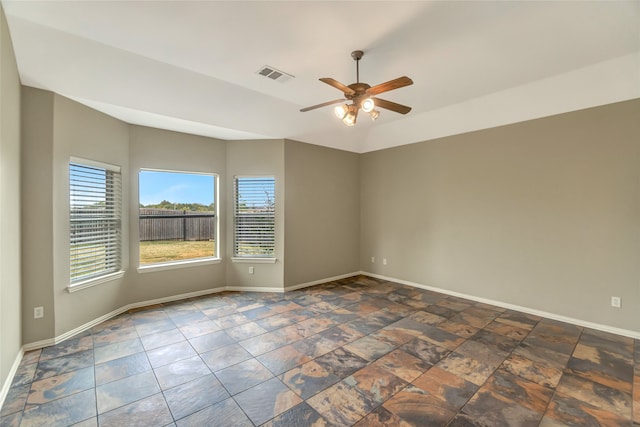 unfurnished room with ceiling fan