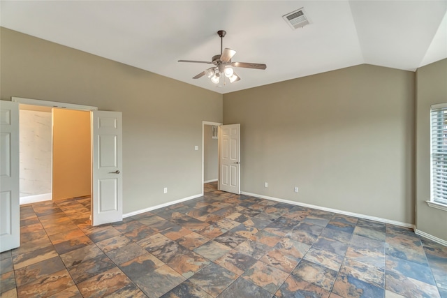 unfurnished bedroom with lofted ceiling and ceiling fan