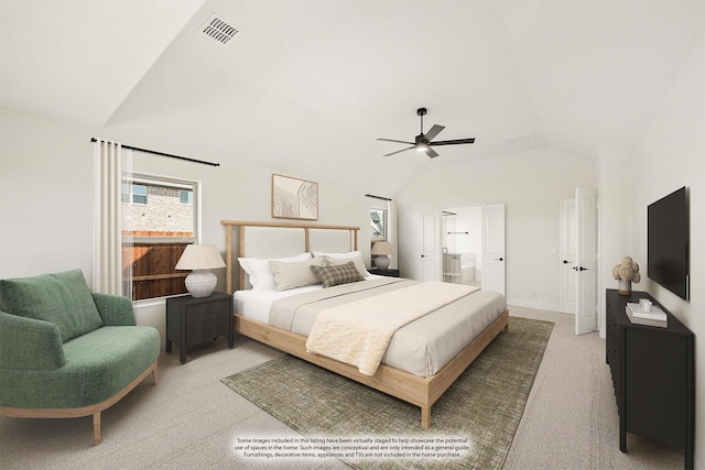 bedroom with vaulted ceiling, ensuite bath, visible vents, ceiling fan, and light colored carpet