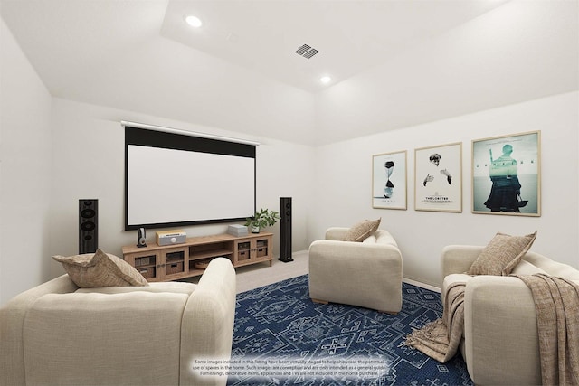carpeted cinema room with visible vents, baseboards, recessed lighting, and vaulted ceiling