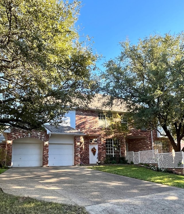 view of front of property featuring a garage