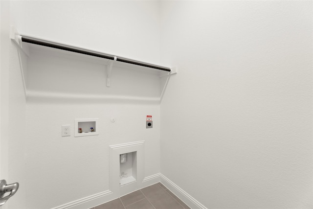 3601 Long Branch Blvd, Rowlett, TX 75088 - laundry room featuring hookup for a gas dryer, hookup for an electric dryer, washer hookup, baseboards, and dark tile patterned flooring