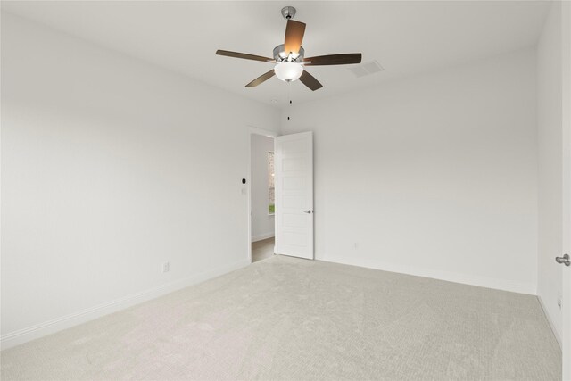 3601 Long Branch Blvd, Rowlett, TX 75088 - spare room featuring light carpet, a ceiling fan, and baseboards