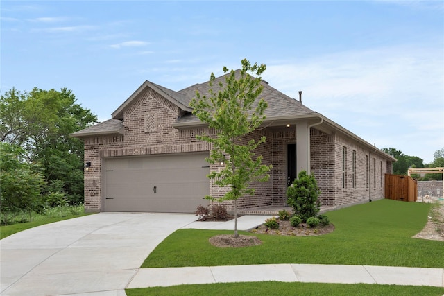 3601 Long Branch Blvd, Rowlett, TX 75088 - view of front of property featuring brick siding, concrete driveway, and roof with shingles
