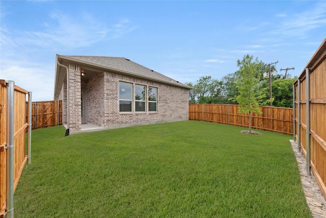 3601 Long Branch Blvd, Rowlett, TX 75088 - rear view of house featuring brick siding and a shingled roof