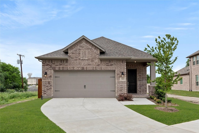 french country style house featuring a front lawn, brick siding, and a shingled roof