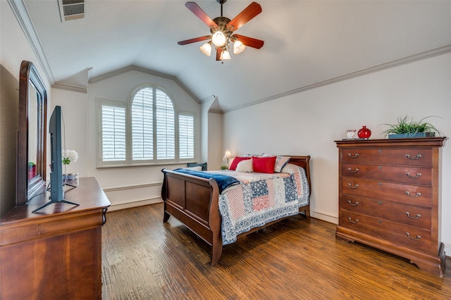 bedroom featuring ceiling fan, crown molding, vaulted ceiling, and dark hardwood / wood-style flooring