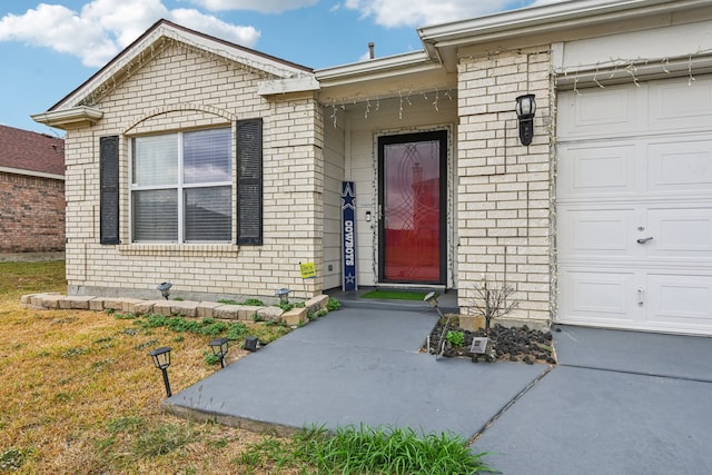 property entrance with a garage