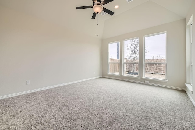 unfurnished room featuring carpet, high vaulted ceiling, and ceiling fan