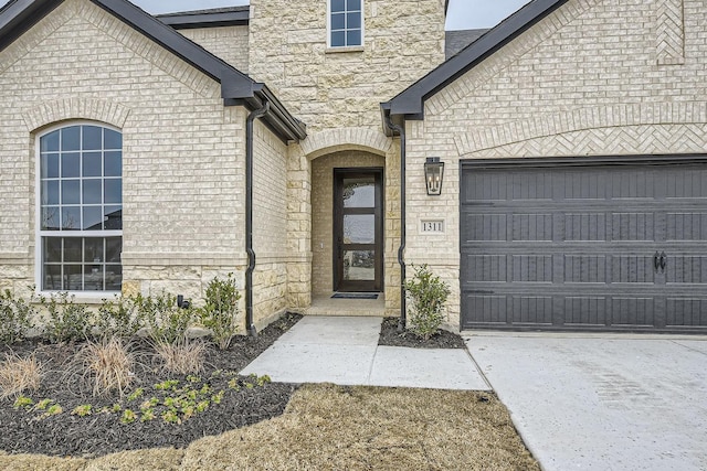 property entrance with a garage