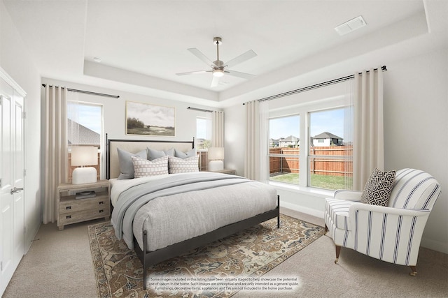 8924 New Ballinger Dr, Denton, TX 76226 - bedroom with carpet, visible vents, a tray ceiling, and ceiling fan
