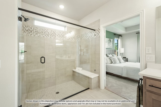 bathroom featuring vanity, tile patterned floors, and an enclosed shower