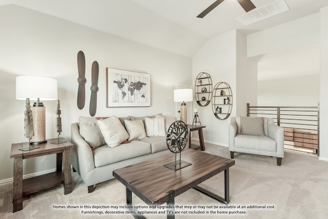 carpeted living room featuring ceiling fan and vaulted ceiling