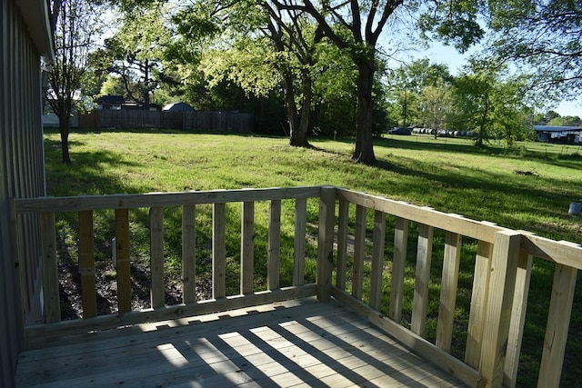 wooden balcony featuring a deck