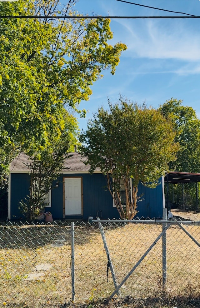 view of front of house with a carport