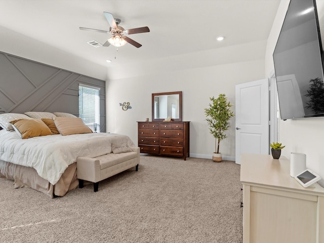 bedroom with ceiling fan and carpet floors