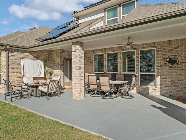 view of patio featuring ceiling fan