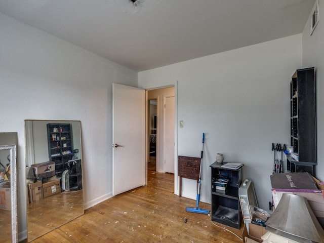 office space with hardwood / wood-style floors