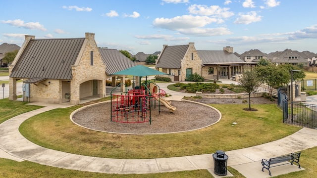 view of jungle gym with a lawn