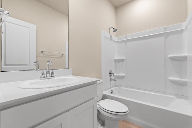 full bathroom featuring toilet, vanity, and shower / bathtub combination