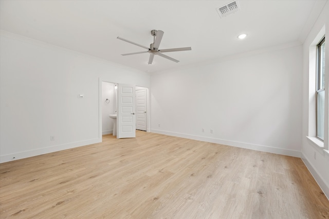 unfurnished bedroom featuring ornamental molding, light hardwood / wood-style flooring, ceiling fan, and ensuite bath