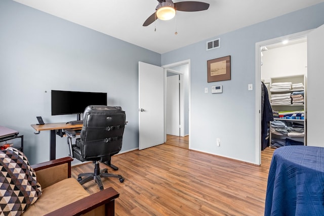 office area featuring ceiling fan and light wood-type flooring