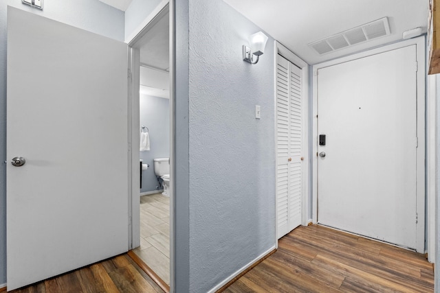 interior space with dark wood-type flooring