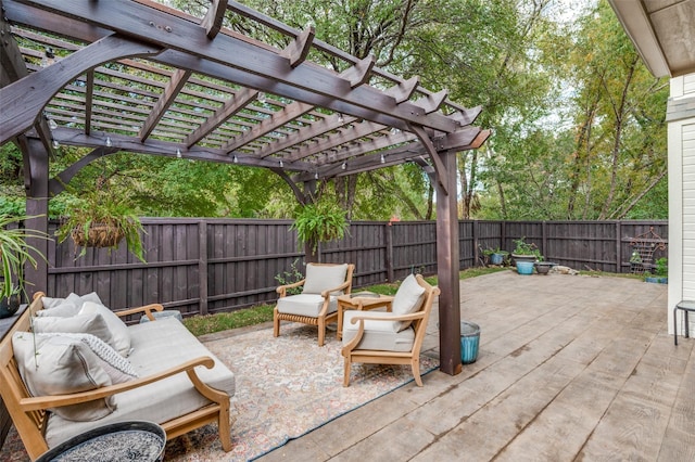 view of patio / terrace with an outdoor living space and a pergola