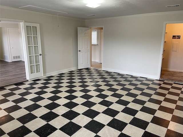 unfurnished room with ornamental molding