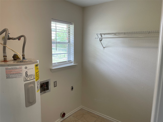 laundry room with water heater, hookup for a washing machine, light tile patterned floors, and hookup for an electric dryer